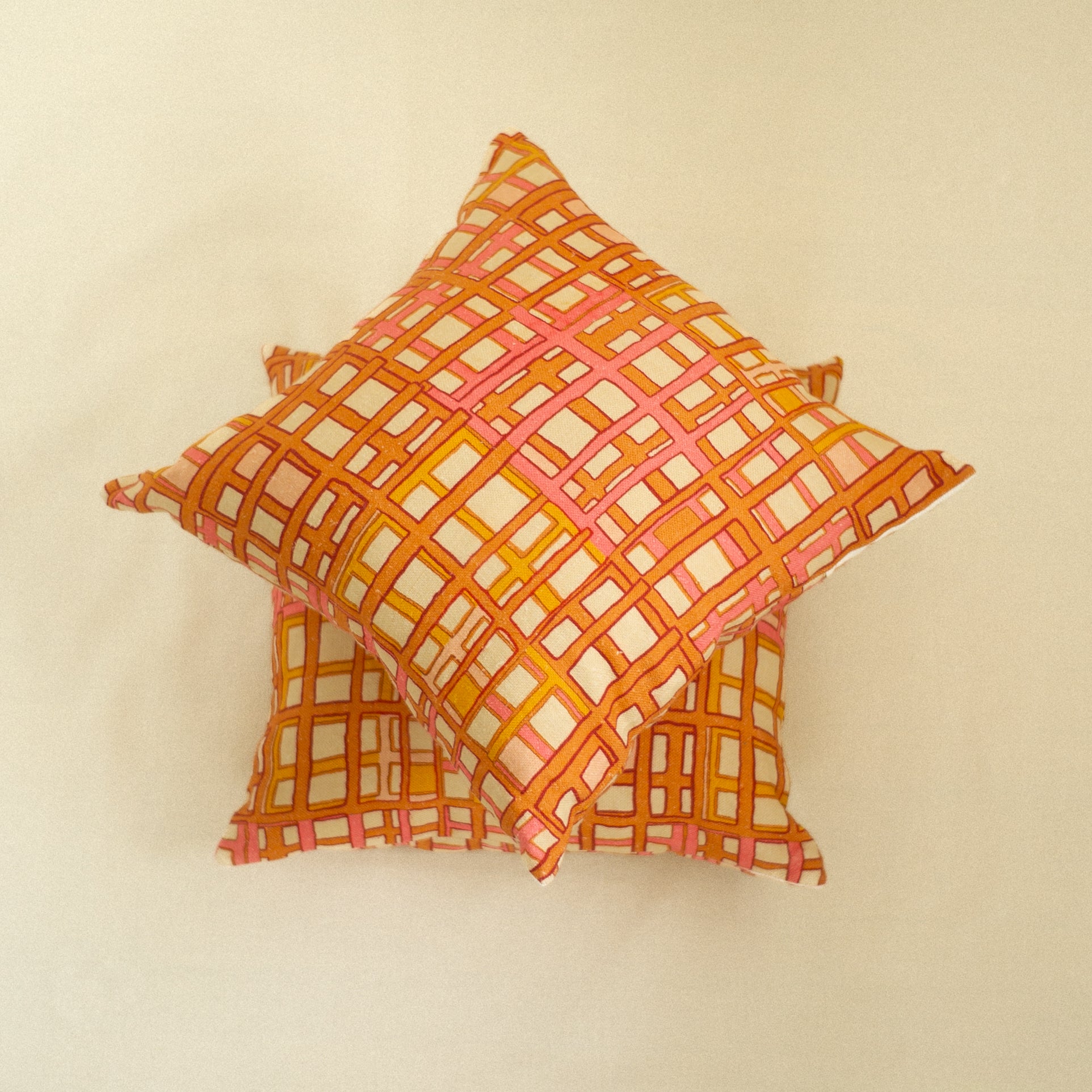 Decorative pillow with a geometric orange pattern art deco