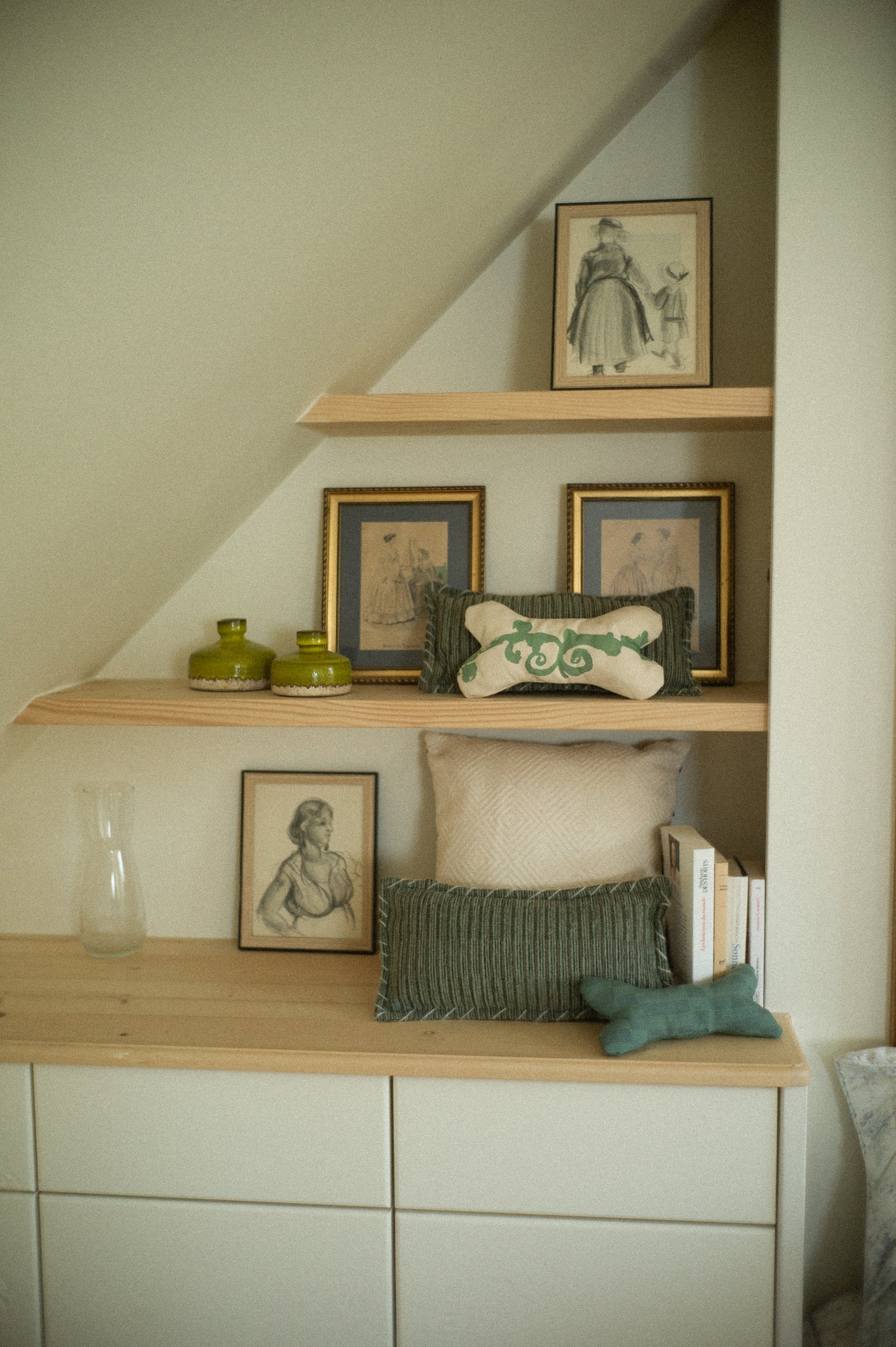 Wooden shelves with decorative pillows